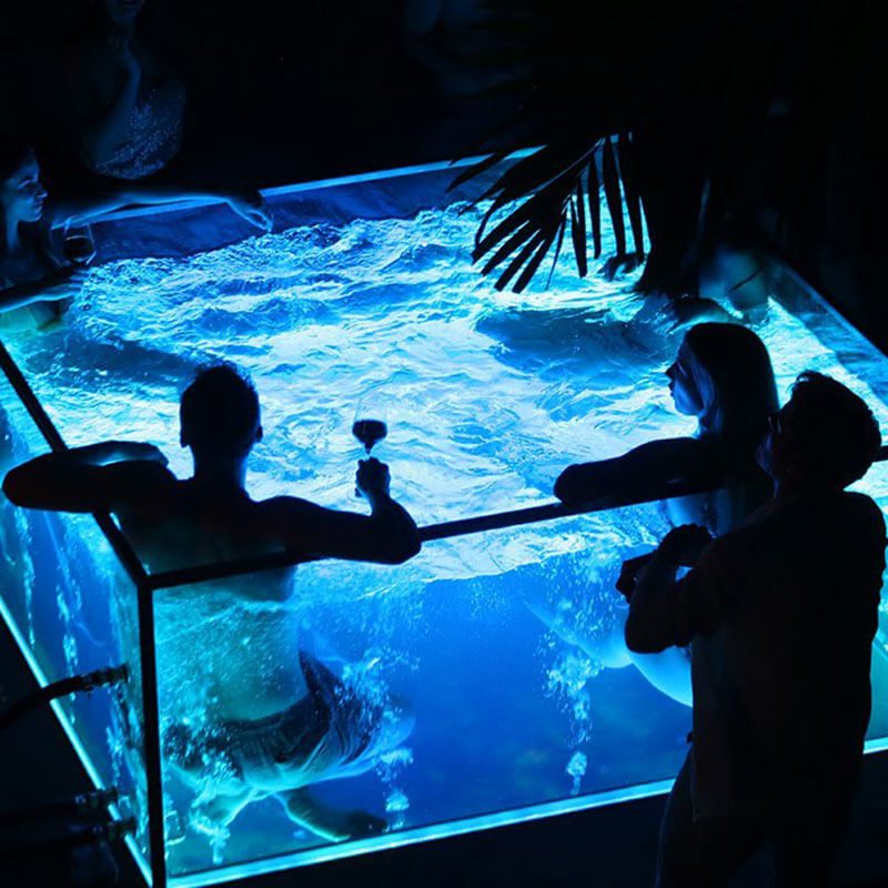 This Glass Hot Tub Decked with LED Lighting Provides an Experience like